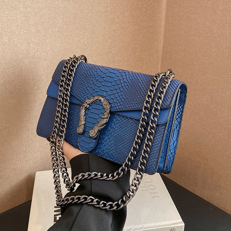 Maison Maryim Croc-Embossed Evening Bag — side view — evening bag
