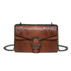 Maison Maryim Croc-Embossed Evening Bag — front view — evening bag