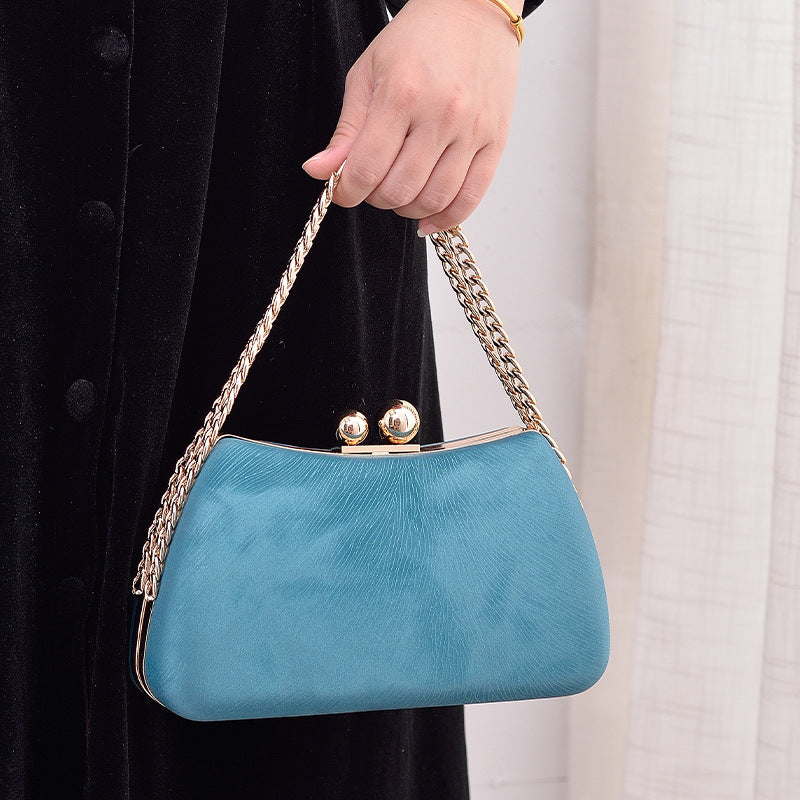Maison Maryim Structured Pillow Evening Bag — detail view — evening bag