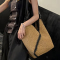 Maison Maryim Striped Woven Straw Tote with Black Trim — front view — handbag