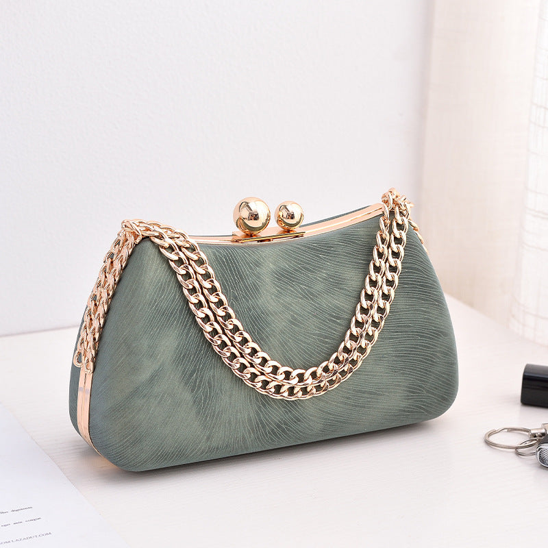 Maison Maryim Structured Pillow Evening Bag — styled view — evening bag