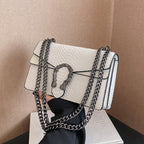 Maison Maryim Croc-Embossed Evening Bag — detail view — evening bag