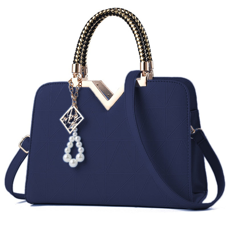 Maison Maryim Embroidered Top-Handle Tote — styled view — tote