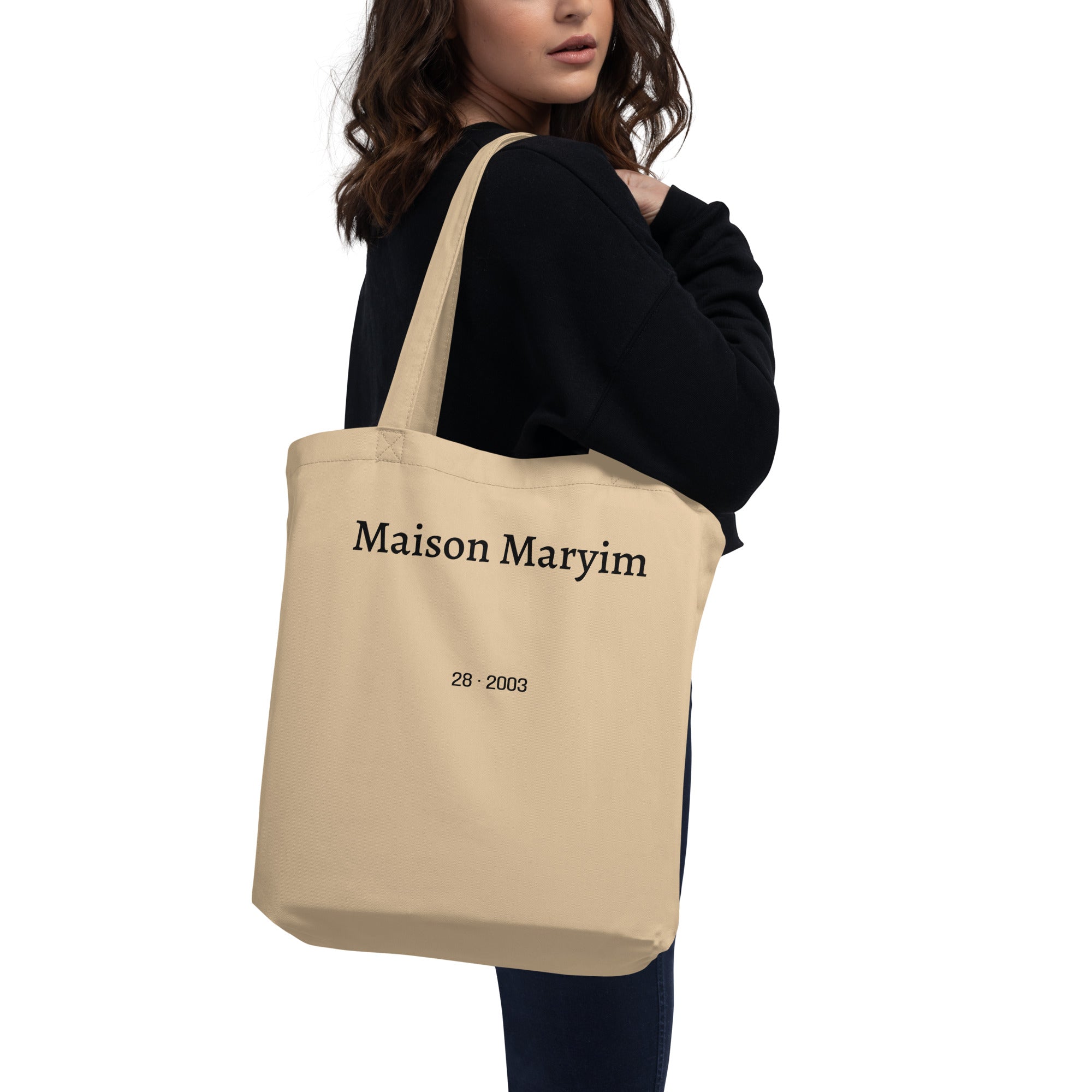Maison Maryim Spectre Embroidered Tote in Oyster — side profile showing dual top handles